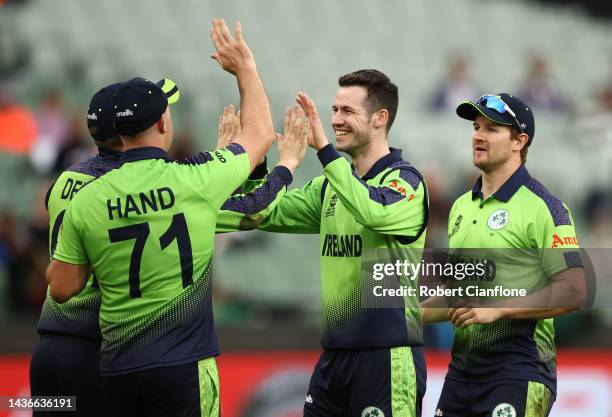 George Dockrell of Ireland celebrates taking the wicket of Harry Brook of England during the ICC Men's T20 World Cup match between England and...