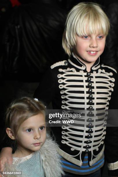 The children of model Natalia Vodianova, Neva Portman and Alexander Portman backstage at Alexander Wang's fall 2010 runway show.