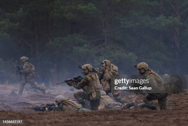 Belgian troops participate in the NATO Iron Wolf military exercises on October 26, 2022 in Pabrade, Lithuania. NATO maintains a contingent of troops...