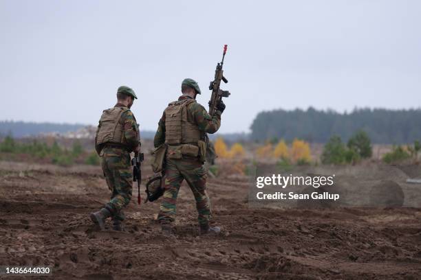 Belgian troops participate in the NATO Iron Wolf military exercises on October 26, 2022 in Pabrade, Lithuania. NATO maintains a contingent of troops...