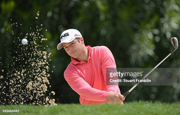 Julien Quesne of France plays a bunker shot during the pro-am prior to the start of the Open de Espana at Real Club de Golf de Sevilla on May 2, 2012...