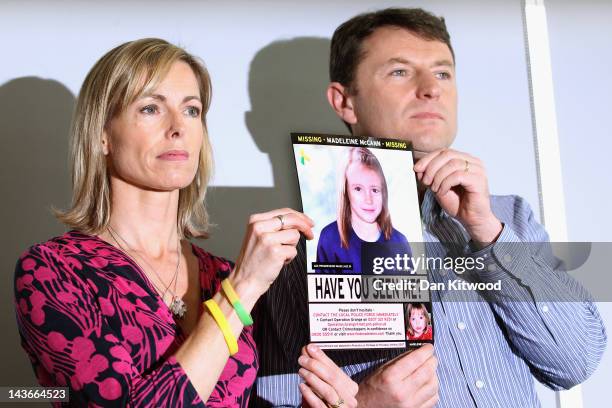 Kate and Gerry McCann hold an age-progressed police image of their daughter during a news conference to mark the 5th anniversary of the disappearance...