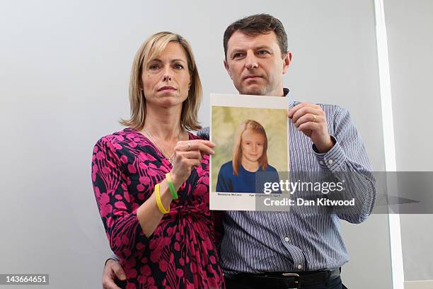 Kate and Gerry McCann hold an age-progressed police image of their daughter during a news conference to mark the 5th anniversary of the disappearance...