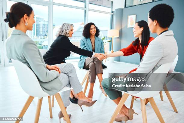 handshake, meeting and collaboration with a team of business people in agreement in the office. thank you, partnership and b2b with a female leader and employee shaking hands for teamwork or unity - thank you smile stock pictures, royalty-free photos & images