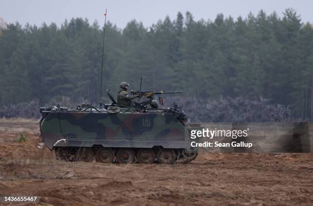 Lithuanian M113 armoured personnel carrier participates in the NATO Iron Wolf military exercises on October 26, 2022 in Pabrade, Lithuania. NATO...