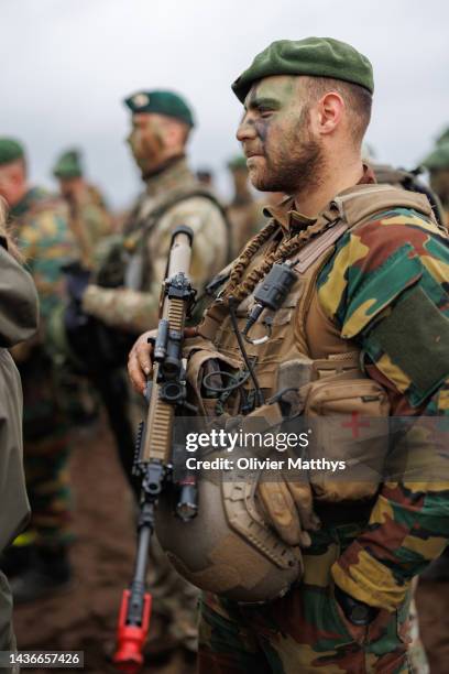 Belgian troops listen to King Philippe of Belgium addressing the troops of the NATO Enhanced Forward Presence Battalion Mechanised Infantry Brigade...