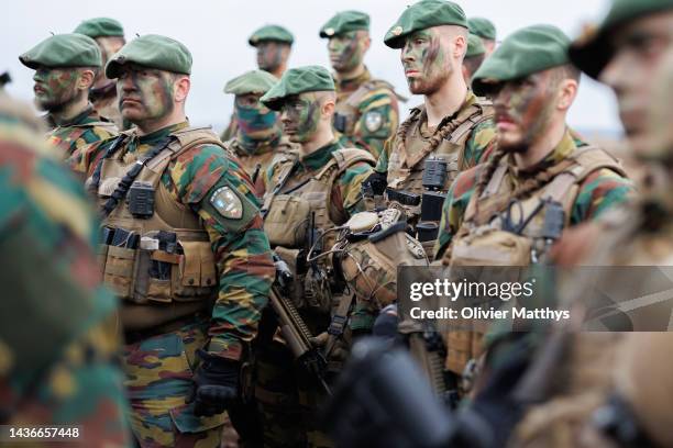 Belgian troops listen to King Philippe of Belgium addressing the troops of the NATO Enhanced Forward Presence Battalion Mechanised Infantry Brigade...