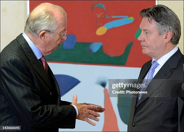 King Albert II of Belgium speaks with Belgian Commissioner Karel De Gucht as he visits the EEC Commission on May 2, 2012 in Brussels, Belgium.