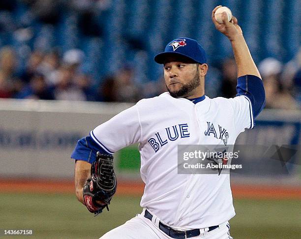 Luis Perez of the Toronto Blue Jays throws a pitch against the Texas Rangers during MLB action at the Rogers Centre April 30, 2012 in Toronto,...