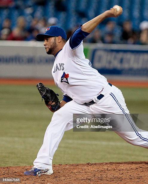 Luis Perez of the Toronto Blue Jays throws a pitch against the Texas Rangers during MLB action at the Rogers Centre April 30, 2012 in Toronto,...