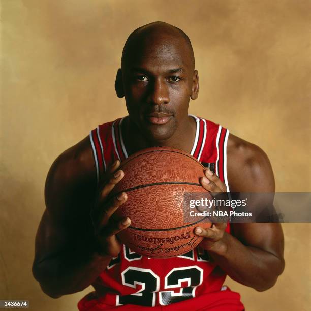 Michael Jordan of the Chicago Bulls poses for a portrait during the 1985 NBA season in Chicago, Illinois. NOTE TO USER: User expressly acknowledges...