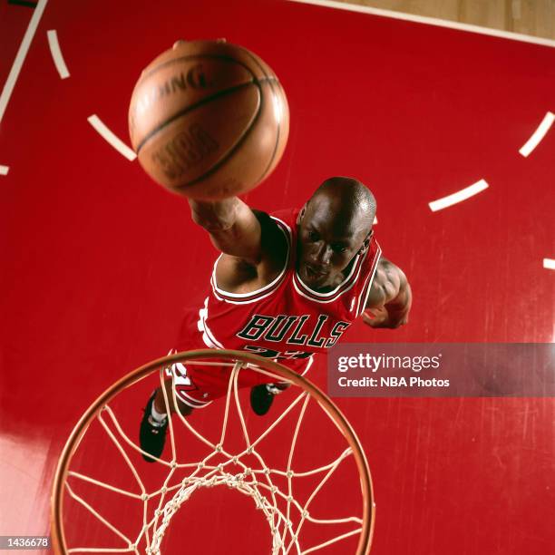 Michael Jordan of the Chicago Bulls goes up for a slam dunk in 1995 during an NBA game. NOTE TO USER: User expressly acknowledges and agrees that, by...