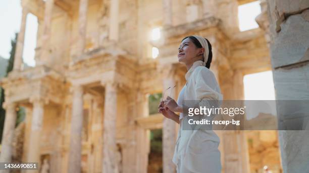 portrait of female young tourist in historical ancient old town - ephesus stock pictures, royalty-free photos & images