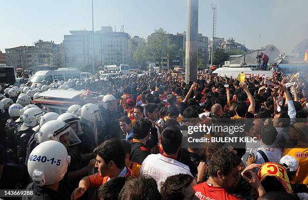 Galatasaray football team fans gather on Taksim Square to protest against the Turkish Football Federation on May 2 in Istanbul. Top sides...