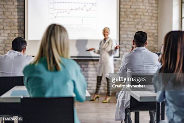 medical seminar in the hospital! - attendee stock pictures, royalty-free photos & images