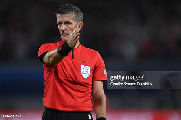 Referee Daniele Orsato looks on during the UEFA Champions League group F match between RB Leipzig and Real Madrid at Red Bull Arena on October 25,...