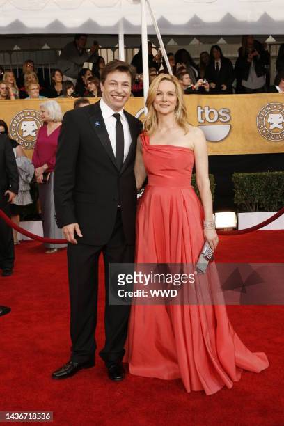 Marc Schauer and Laura Linney attend the 15th annual Screen Actors Guild Awards at the Shrine Auditorium. Linney wears Michael Kors and Cathy...