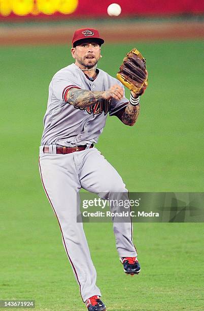 Ryan Roberts of the Arizona Diamondbacks throws to first base during a MLB game against the Miami Marlins at Marlins Park on April 30, 2012 in Miami,...