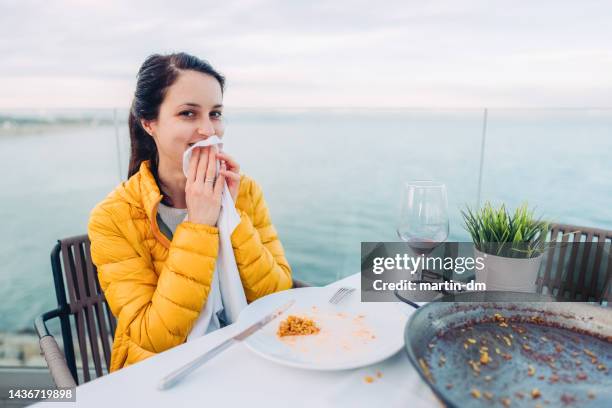 spanish paella and wine - white dinner jacket stock pictures, royalty-free photos & images