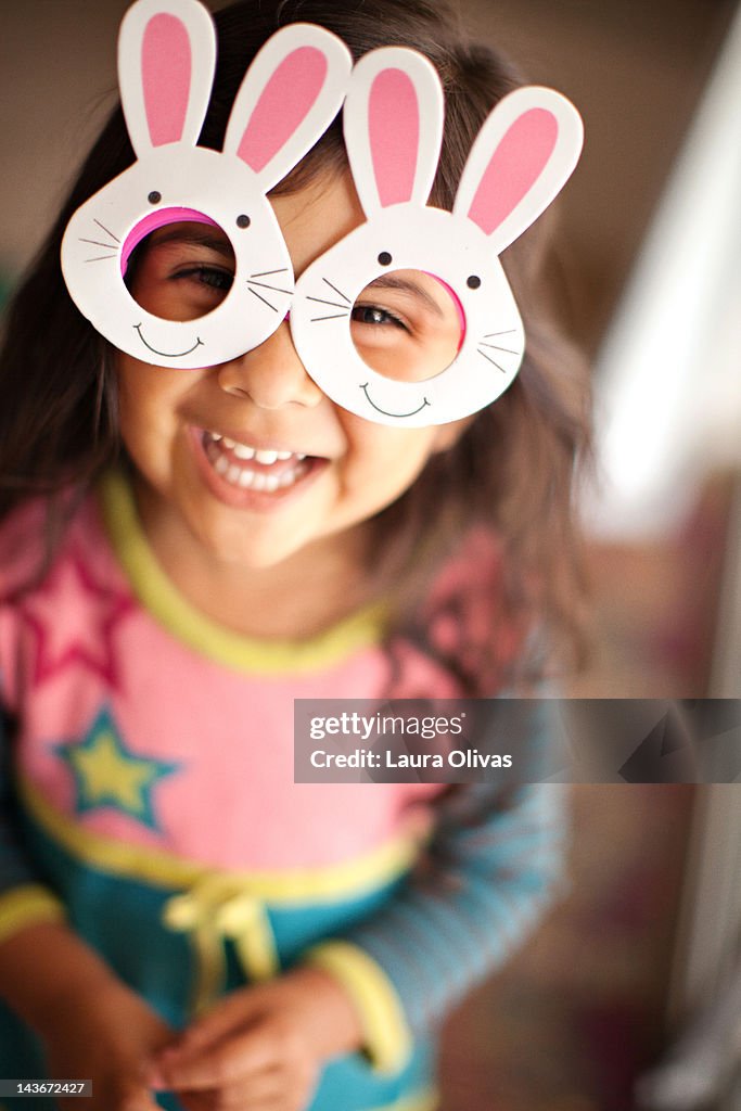 Toddler girl wearing funny glasses