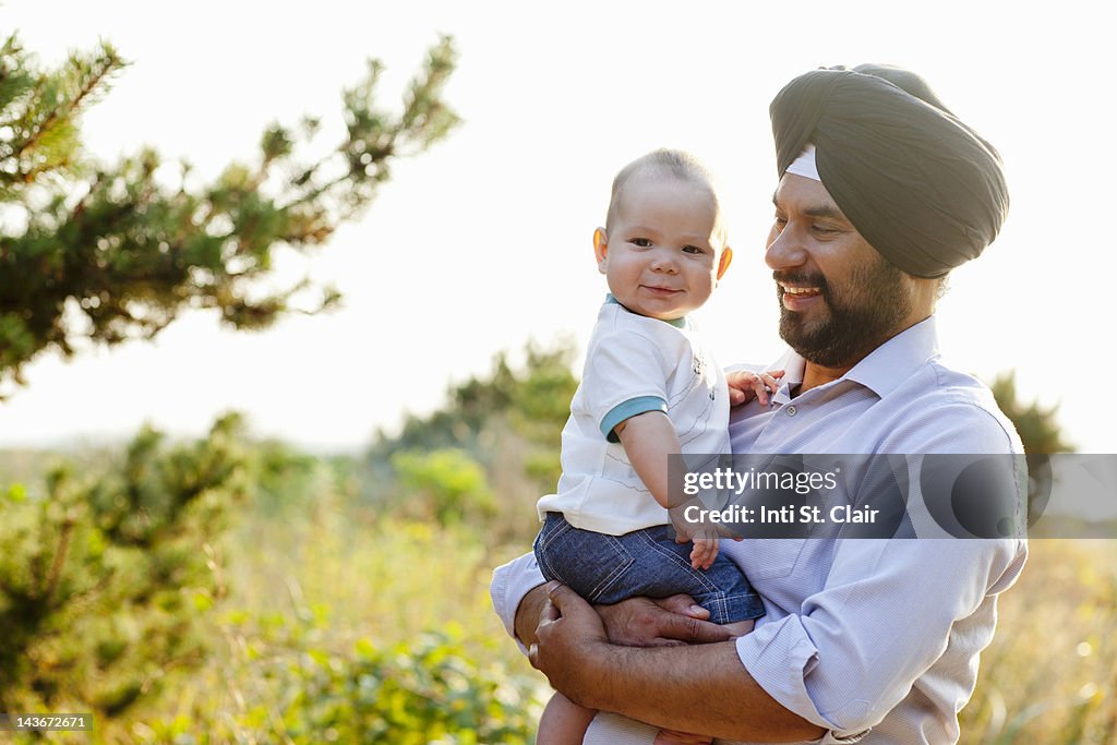 Sikh Indian man with his son