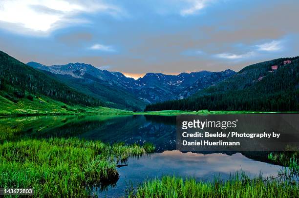sunrise behind gore range at piney lake - piney lake stock pictures, royalty-free photos & images