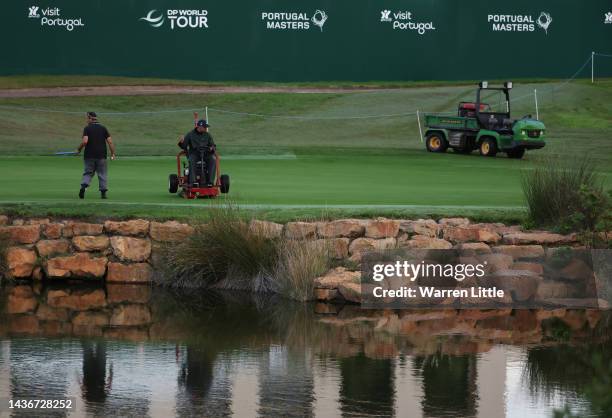 Greenkeepers prepares the 18th green ahead of the Portugal Masters at Dom Pedro Victoria Golf Course on October 26, 2022 in Quarteira, Portugal.