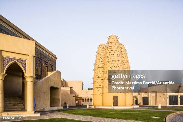 katara cultural village, the bird towers or pigeon towers and the iranian style mosque - katara art center stock pictures, royalty-free photos & images