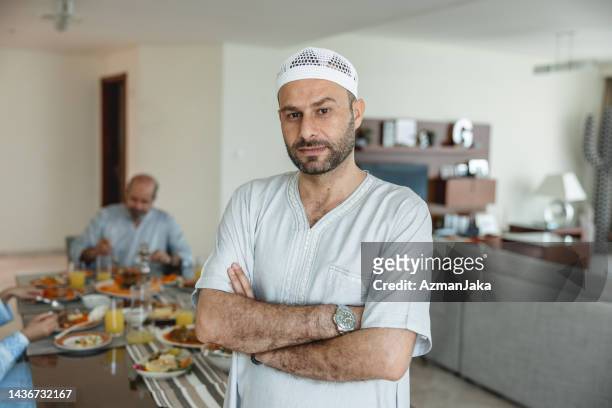 portrait of middle eastern male looking serious - ghoutra stock pictures, royalty-free photos & images