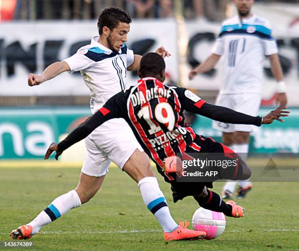 Lille's mildfielder Eden Hazard vies with Nice's forward Franck Dja Dje Dje during their French L1 football match Nice vs Lille, on May 2, 2012 at...