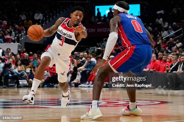 Bradley Beal of the Washington Wizards drives to the basket against Jalen Duren of the Detroit Pistons during the second half at Capital One Arena on...