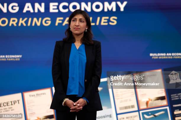Federal Trade Commission Chair Lina Khan listens as U.S. President Joe Biden delivers remarks on the economy in the Eisenhower Executive Office...