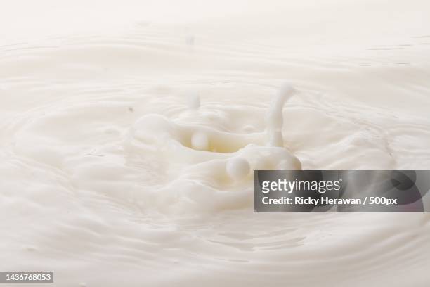 full frame shot of milk,bekasi,indonesia - milk full frame stock pictures, royalty-free photos & images