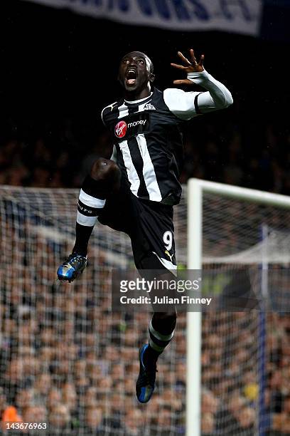 Papiss Cisse of Newcastle celebrates after scoring the opening goal during the Barclays Premier League match between Chelsea and Newcastle United at...