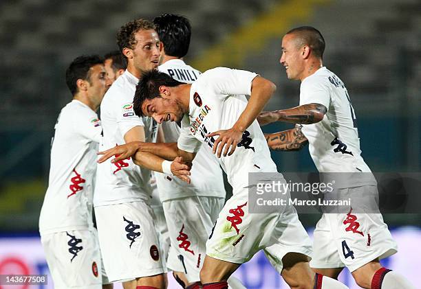 Lorenzo Ariaudo of Cagliari Calcio celebrates with team-mates after scoring his goal during the Serie A match between Genoa CFC and Cagliari Calcio...