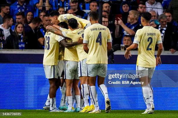 Mehdi Taremi of FC Porto celebrates after scoring his sides first goal with his team mates during the Group B - UEFA Champions League match between...