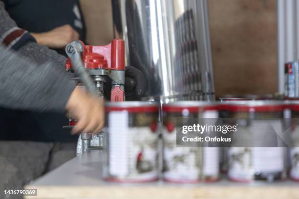 maple syrup production steps at sugar shack, quebec, canada - sugar shack stockfoto's en -beelden