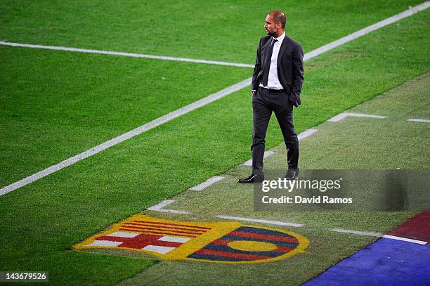 Head coach Josep Guardiola of FC Barcelona looks on during the La Liga match between FC Barcelona and Malaga CF at Camp Nou Stadium on May 2, 2012 in...