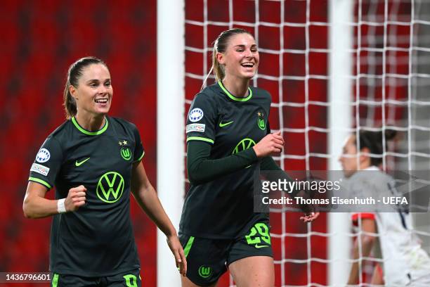Jule Brand of Wolfsburg celebrates scoring their side's first goal with teammates Ewa Pajor during the UEFA Women's Champions League group B match...