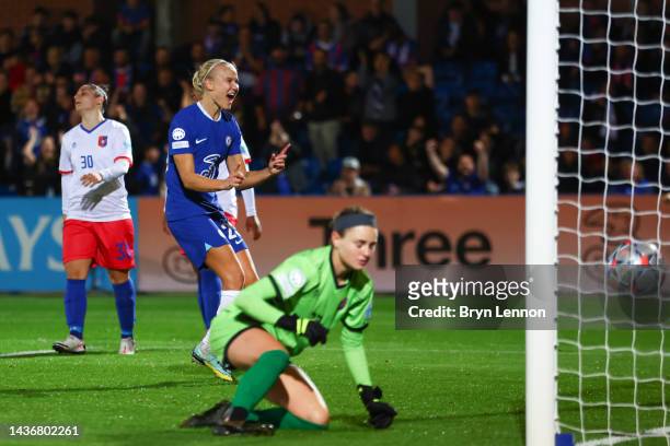 Pernille Harder of Chelsea celebrates scoring their side's third goal as players of FKK Vllaznia look dejected during the UEFA Women's Champions...