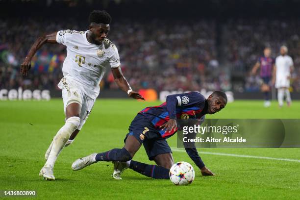 Alphonso Davies of Bayern Munich battles for possession with Ousmane Dembele of FC Barcelona during the UEFA Champions League group C match between...