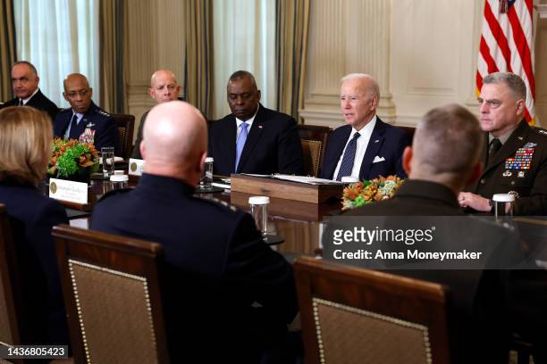 President Joe Biden gives remarks before the start of a meeting with leaders from the Department of Defense in the State Dining Room of the White...