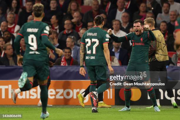 Darwin Nunez celebrates with Andy Robertson of Liverpool after scoring their team's second goal during the UEFA Champions League group A match...