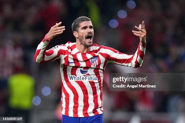 Rodrigo De Paul of Atletico Madrid celebrates after scoring their team's second goal during the UEFA Champions League group B match between Atletico...