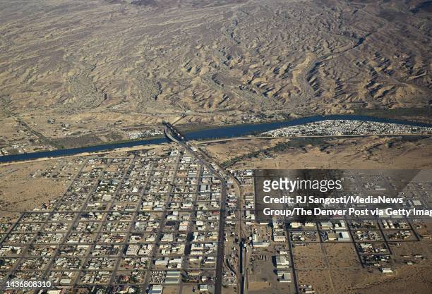 The town of Parker is built along the Colorado River near Lake Havasu on October 24, 2022 in Parker, Arizona. The flight for aerial photography was...