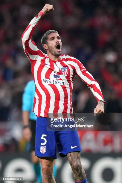 Rodrigo De Paul of Atletico Madrid celebrates after scoring their team's third goal during the UEFA Champions League group B match between Atletico...