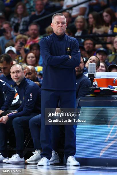 Head coach Michael Malone stands on the sidelines during the first quarter of the game against the Oklahoma City Thunder at Ball Arena on October 22,...