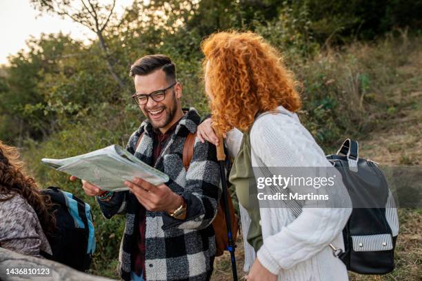 adventure time - young couple hiking stock pictures, royalty-free photos & images