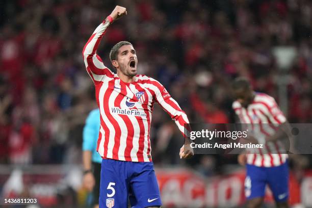 Rodrigo De Paul of Atletico Madrid celebrates after scoring their team's third goal during the UEFA Champions League group B match between Atletico...