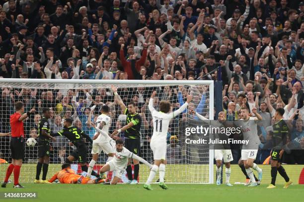 Rodrigo Bentancur of Tottenham Hotspur celebrates with teammates after scoring their side's first goal during the UEFA Champions League group D match...